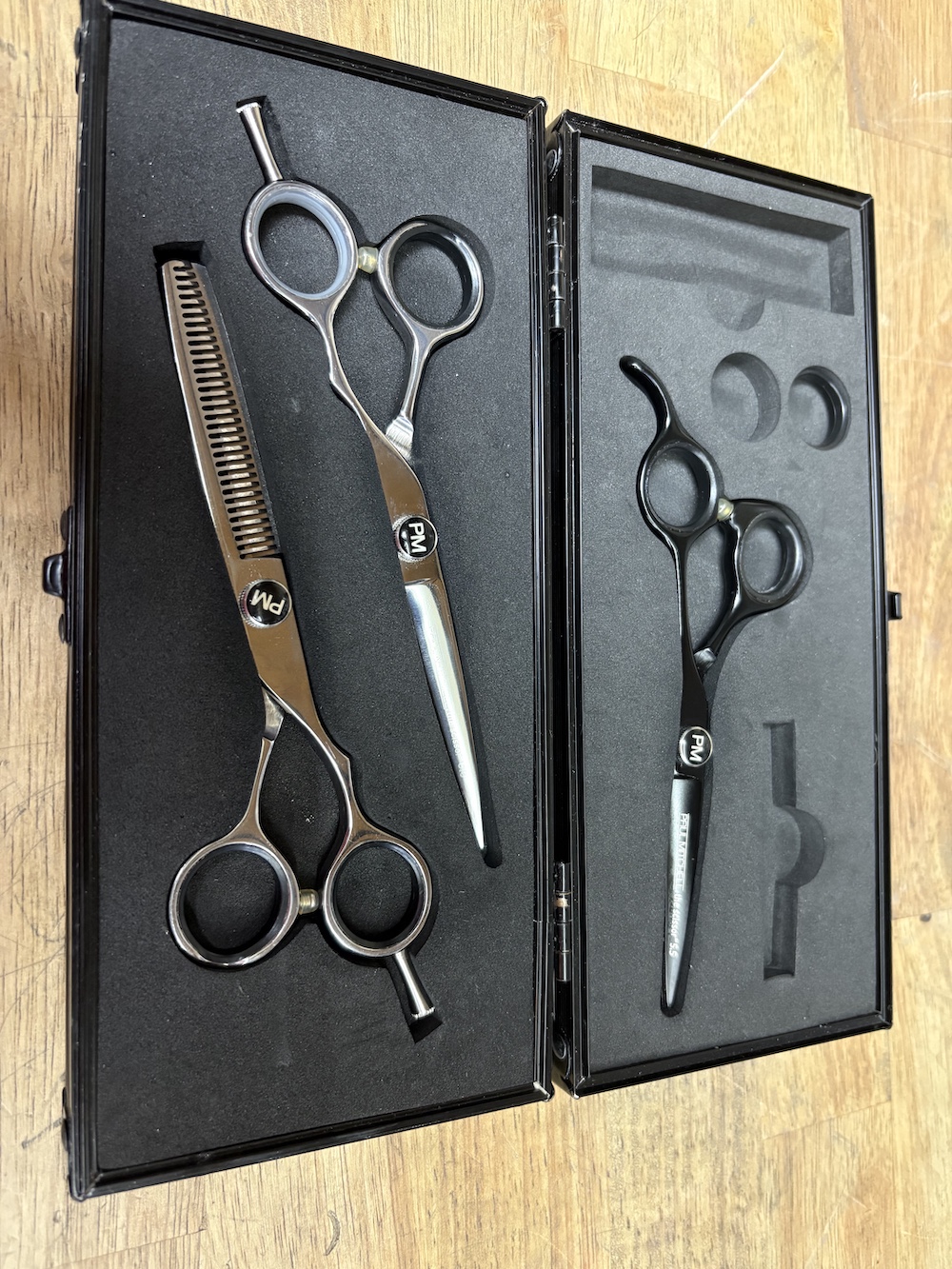 Set of grooming shears for a local dog groomer.
