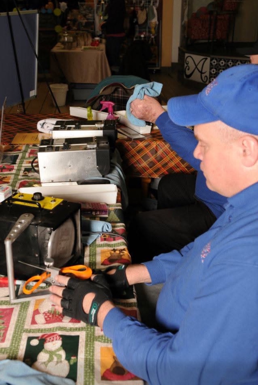Our team sharpening shears on a workbench.